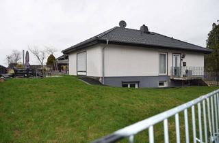 Einfamilienhaus kaufen in Bachstr. 12, 52355 Düren, Einfamilienhaus im Bungalowstil am ruhigen Feldrand