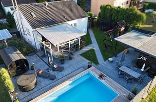 Einfamilienhaus kaufen in 65329 Hohenstein, Wohnen wie im Urlaub: Einfamilienhaus in Wiesenrandlage mit Energieklasse 'A' , Pool und Sauna