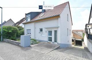 Wohnung kaufen in 67551 Worms, Ebenes Gartenglück & Kaminfeuer: Modernisierte 2-Zimmer-Wohnung mit Terrasse & Carport