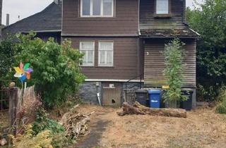Haus kaufen in 35713 Eschenburg, Eschenburg - Sanierungsimmobilie mit Potential für Handwerker in Hirzenhain