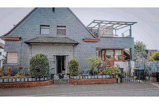 Haus kaufen in 66333 Völklingen, Völklingen - Haus mit zwei Wohnungen & Garage - Heidstock