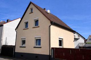 Einfamilienhaus kaufen in 63110 Rodgau, Rodgau - Charmantes Einfamilienhaus mit Nebengebäude im Herzen von Rodgau-Dudenhofen!