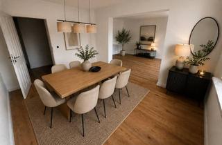 Wohnung kaufen in 44289 Sölde, Modernisierte 4-Zimmer-Eigentumswohnung mit Balkonen und eigenem Garten in Dortmund-Sölde
