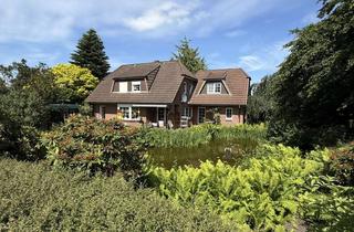 Einfamilienhaus kaufen in 25364 Osterhorn, Einfamilienhaus mit Anbau und großem Teich