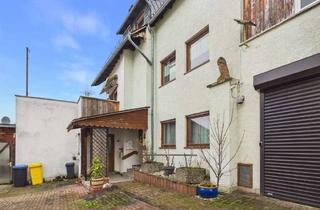 Einfamilienhaus kaufen in 56348 Bornich, Einfamilienhaus mit Garage, Werkstatt und Einliegerwohnung in Bornich zu verkaufen