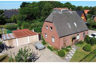 Einfamilienhaus kaufen in 26919 Brake, Viel Potential zum fairen Preis! Einfamilienhaus mit 5 Zimmern, großem Garten und drei Garagen