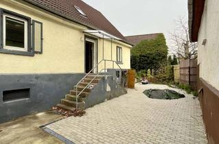 Einfamilienhaus kaufen in 64380 Roßdorf, Charmantes Einfamilienhaus in Roßdorf – Viel Platz für individuelles Wohnen