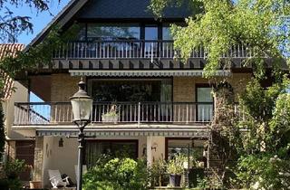 Haus kaufen in 23858 Reinfeld, Architekten-Klassiker mit Potenzial in zentraler Lage