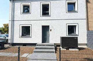 Wohnung kaufen in 48231 Warendorf, Stilvoll modernisiert: Gemütliche Wohnung im 1. Obergeschoss mit Balkon