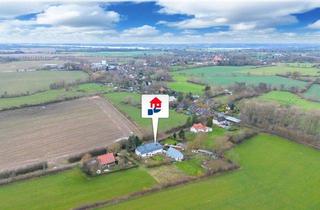 Doppelhaushälfte kaufen in 24398 Dörphof, Ruhige Feldrandlage nahe der Ostsee - liebevoll gepflegtes Haus mit großem Grundstück!