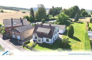 Einfamilienhaus kaufen in 37154 Northeim, Einfamilienhaus mit großzügigem Grundstück und vier Garagen