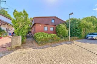 Einfamilienhaus kaufen in 67069 Ludwigshafen, Charmantes Einfamilienhaus mit großem Grundstück und zusätzlichem Bauplatz plus 2 Garagen !!