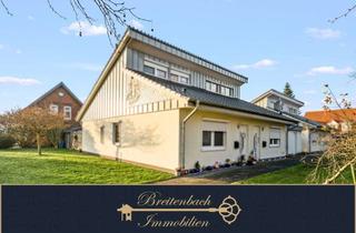 Wohnung kaufen in 26919 Brake, Stilvolle Doppelhaushälfte mit offener Galerie und Terrasse