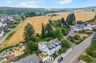 Haus kaufen in 61273 Wehrheim, TRAUMHAFTES ARCHITEKTENHAUS IN ERSTER FELDRANDLAGE – 409 m² Wohnen & Arbeiten im Grünen