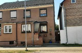 Doppelhaushälfte kaufen in 99752 Bleicherode, Bleicherode - Solide Doppelhaushälfte mit Garage & Idyllischem Garten