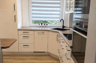 Wohnung kaufen in 59755 Arnsberg, Aufwendig kernsanierte Erdgeschosswohnung mit Balkon in schöner Lage von Arnsberg-Moosfelde