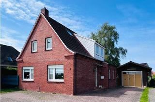 Einfamilienhaus kaufen in 26736 Krummhörn, Gemütliches Einfamilienhaus mit großer Garage, überdachter Terrasse und Garten