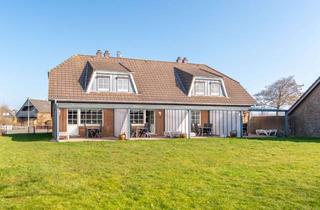 Haus kaufen in 25718 Friedrichskoog, Attraktives Renditeobjekt in Deichnähe: 4 Reihenhäuser und großzügiger Garten