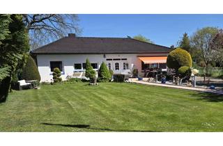 Haus kaufen in 23869 Elmenhorst, Walmdach-Bungalow mit großem Grundstück & ca. 260m² Wohn-/Nutzfläche in Feldrandlage