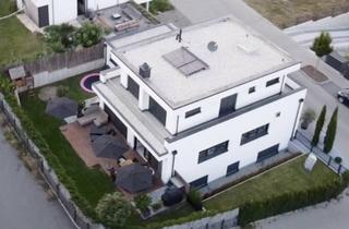 Einfamilienhaus kaufen in 65812 Bad Soden, Architektonische Eleganz in exklusiver Feldrandlage – freistehendes Einfamilienhaus mit Skylineblick