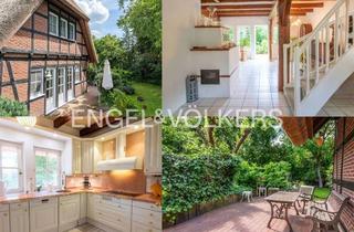 Villa kaufen in 27367 Hellwege, Wohnen unter Reet – charmante Villa mit idyllischem Garten