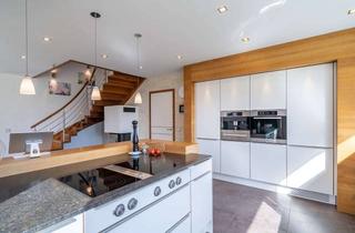 Einfamilienhaus kaufen in 86807 Buchloe, Moderne Eleganz trifft naturnahes Wohnen – energieeffizientes Einfamilienhaus mit Doppelgarage in Bu