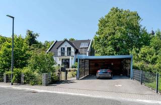 Haus kaufen in 61276 Weilrod, Wohnen im Einklang mit der Natur: A+-Familienidylle mit großzügigem Platzangebot und Doppelcarport