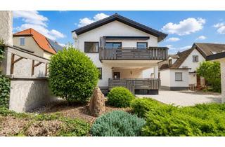 Einfamilienhaus kaufen in 68647 Biblis, Großzügiges Einfamilienhaus mit Garten, Balkon & Garage in ruhiger Lage von Biblis