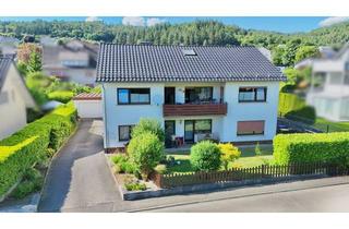Einfamilienhaus kaufen in 35745 Herborn, Einfamilienhaus mit ELW in Herborn OT mit Garten, Terrasse und Garage