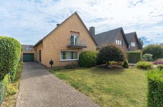 Einfamilienhaus kaufen in 46485 Wesel, Freistehendes Einfamilienhaus mit Garage und großem Grundstück in ruhiger Lage von Wesel-Lackhausen