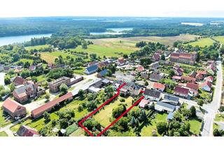 Mehrfamilienhaus kaufen in Ernst-Thälmann-Straße 15, 15306 Falkenhagen, Teilsaniertes Mehrfamilienhaus auf großem Grundstück mit Baulandreserve nahe Schwarzer See
