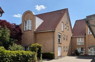 Mehrfamilienhaus kaufen in 55126 Mainz, Entzückende 2-Zimmer-Wohnung mit Terrasse und Gartenanteil
