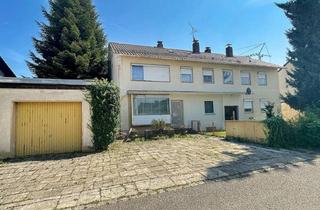 Einfamilienhaus kaufen in 83301 Traunreut, Mehrfamilienhaus mit 3 Wohnungen und Gewerbeeinheit - zentrale Lage, vielseitige Möglichkeiten