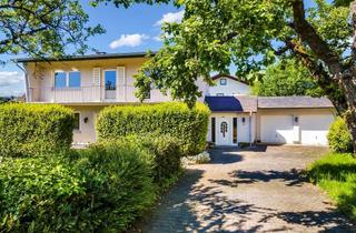 Haus kaufen in 35466 Rabenau, Großzügiges Zuhause für Familien mit Garten, Anbau und Doppelgarage