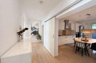 Wohnung kaufen in 30629 Misburg-Nord, Wohnen wie im eigenen Haus – großzügige 4-Zimmer-Gartenwohnung mit zwei Terrassen und Carport