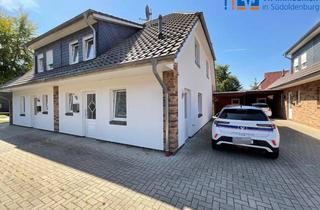 Doppelhaushälfte kaufen in 26219 Bösel, Jetzt frei: Familienglück in Bösel! Moderne Doppelhaushälfte mit Carport.
