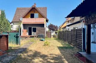 Haus kaufen in 68642 Bürstadt, Bürstadt - 2-Familienhaus mit Garten in Bürstadt ohne Makler
