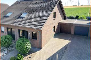 Doppelhaushälfte kaufen in 41836 Hückelhoven, Solide Doppelhaushälfte mit Garten und Garage in Hückelhoven-Brachelen