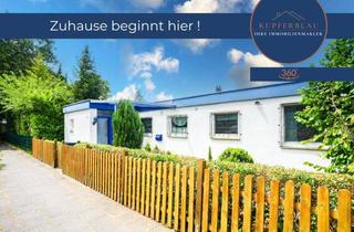 Haus kaufen in 51109 Köln, Freistehender Bungalow mit sonnigem Garten und Garage in Köln-Neubrück