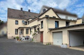 Haus kaufen in 44866 Wattenscheid, Wohn- und Geschäftshaus mit drei Wohnungen, Gewerbe und vier Garagen