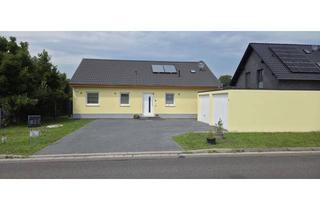 Einfamilienhaus kaufen in 03222 Lübbenau, Modernes Einfamilienhaus mit Doppelgarage, hochwertiger Ausstattung und freiem Blick ins Grüne