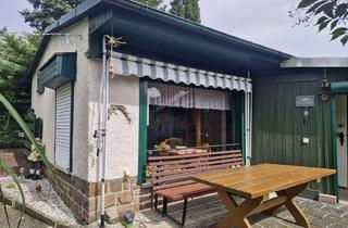 Haus kaufen in 09390 Gornsdorf, Liebhaberobjekt mit Herz: Einzigartiger Bungalow auf Naturgrundstück in sonniger Lage!