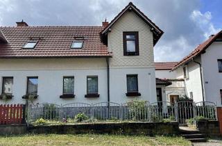 Doppelhaushälfte kaufen in 98527 Suhl, Charmante Doppelhaushälfte mit Garten und vielseitigen Gestaltungsmöglichkeiten