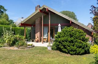 Haus kaufen in 23738 Manhagen, Charmantes Holzhaus in idyllischer Dorflage von Manhagen - ideal als Wochenendhaus oder Erstwohnsitz