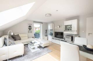 Wohnung kaufen in 85757 Karlsfeld, AIGNER - Modernisierte Dachgeschosswohnung nahe Karlsfelder See