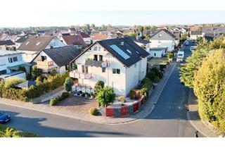 Wohnung kaufen in 63517 Rodenbach, Rodenbach - Helle Dachgeschosswohnung mit Balkon, Tiefgarage & Klimaanlage