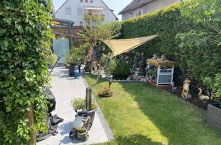 Wohnung kaufen in 90556 Cadolzburg, Vermietete Gartenwohnung mit großer Terrasse und schönem Blick in den Garten ...