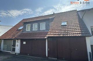 Haus kaufen in 36381 Schlüchtern, Wohnhaus mit Garage, Nebengebäuden und Entwicklungspotenzial in Schlüchtern-Stadt