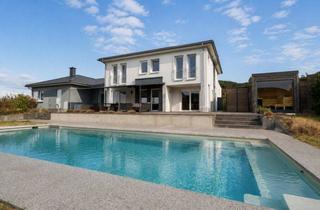 Einfamilienhaus kaufen in 54668 Peffingen, Exklusives Einfamilienhaus mit Pool, Sauna, Whirlpool, Fernblick & Doppelgarage in Peffingen