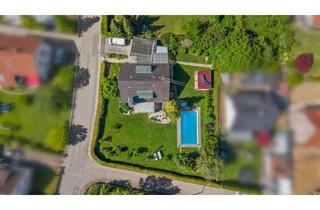 Haus kaufen in 89331 Burgau, Sommer am Pool, Winter am Kamin und ein Gartenparadies für die ganze Familie.